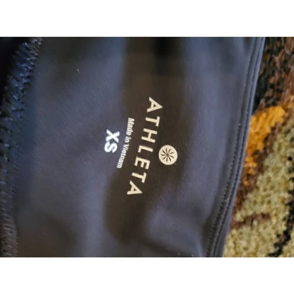 Athleta Stellar Tights Women's XS Black Notched Zip Pockets Comfort